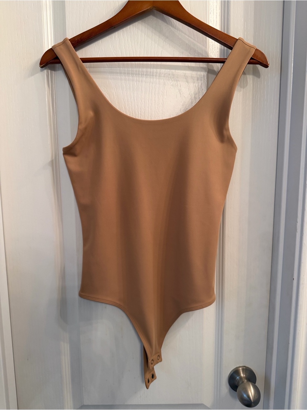 Express Sleeveless One-Piece Bodysuit in Nude
